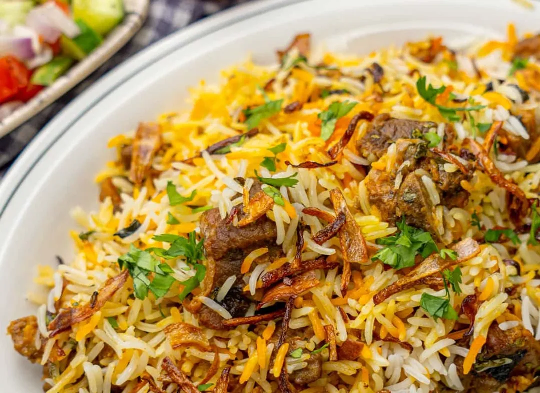 Peri Peri Chicken Biryani with boiled egg at Southern Spices in Winnipeg, MB